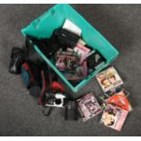 A box of photographic equipment, to include Pentax camera, Super 8 films, manuals etc.