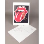 A Rolling Stones logo card signed by Keith Richards.