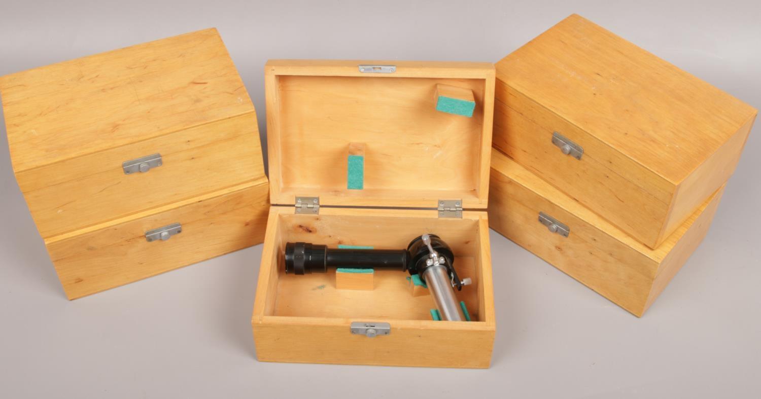 Five cased P20 Wakszama microscope eyepieces.