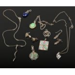 A collection of mainly silver jewellery including three pendant necklaces, four pendants and two