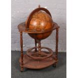 A retro drinks cabinet formed as a terrestrial globe.