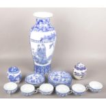 A group lot of oriental ceramics to include large vase, lithographic panelled teacups, lidded jars