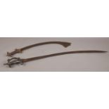 A pair of 18th/ 19th Century Indian Tulwar swords (Length larger sword 76cm, small sword 50cm).