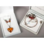 A quantity of mainly silver jewellery including amber and carnelian examples.