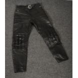 A pair of Leathers International leather motorbike trousers.