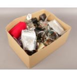 A box of costume jewellery to include beads, watches, bangles, necklaces etc.