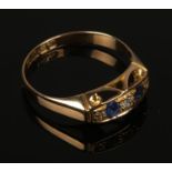 A 18ct gold diamond and sapphire 5 stone ring, Assayed Birmingham 1915. Size M.