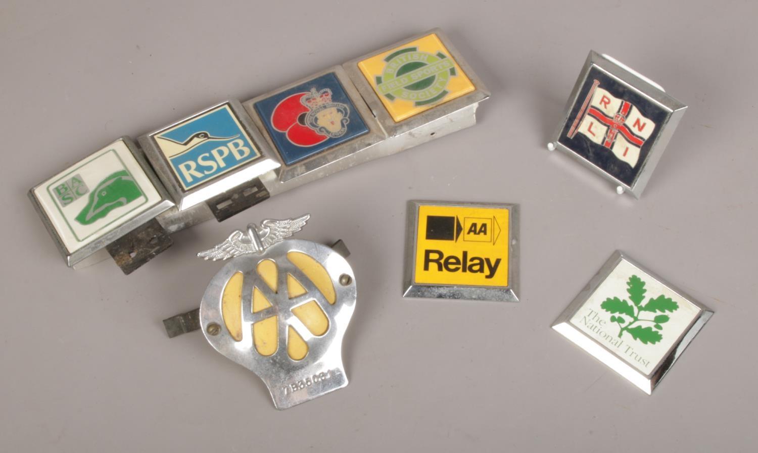 A collection of Vintage Car Badges to include AA, RNLI, The National Trust examples