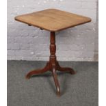 A George III oak centre pedestal snap top occasional table, 54 x 60, 72cm high. Top sections