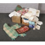 Two boxes of materials, to include linens, Indian rug, cellular blankets etc.
