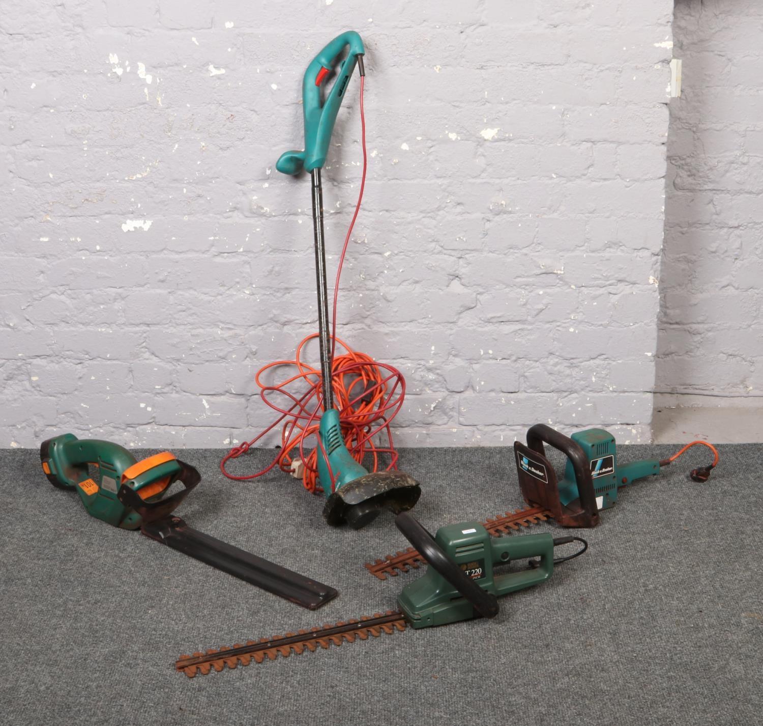 A Bosch electric strimmer, along with three electric hedge trimmers.