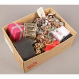 A box of costume jewellery to include beads, bangles, watches, necklaces etc.