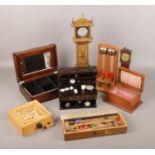 A box of collectables, to include Tri-ang high striker game, jewellery boxes, miniature German