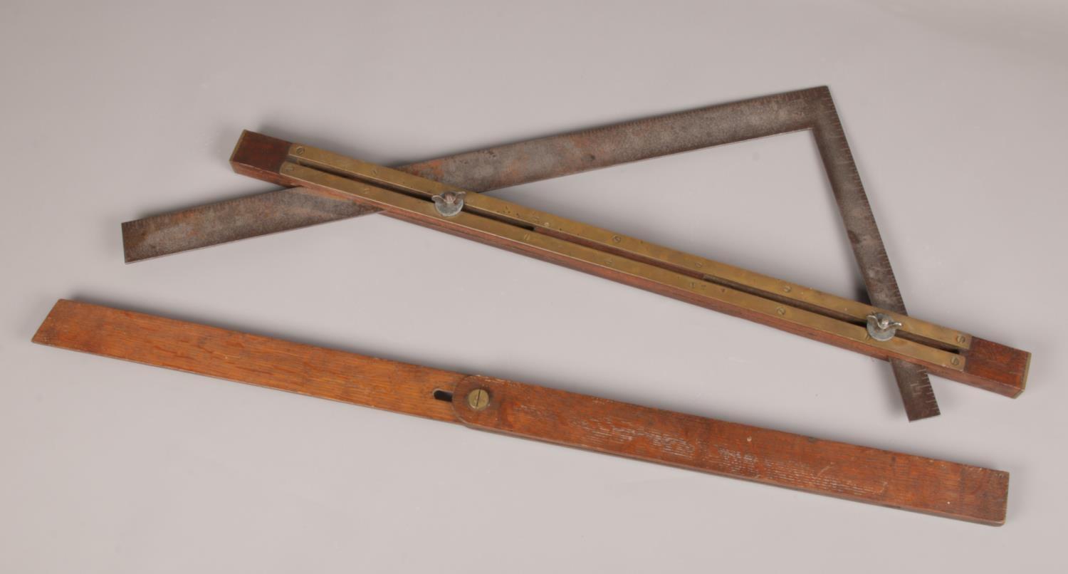 A 19th century roofers square by Victor USA and a wooden bevel gauge.