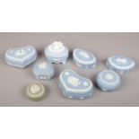 Seven Wedgwood Jasperware trinket boxes and a similar.