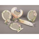 A collection of Franz porcelain, to include photograph frames, pin dish and serviette rings. All