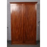 A Victorian mahogany linen press. 207cm tall x 130cm wide.