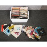 A box of 1960s/70s/80s singles to include Beach Boys, David Bowie, Elvis, Lionel Richie, Cher etc.