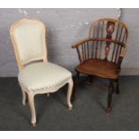 A 19th century ash and elm Windsor armchair and a French style painted chair.