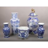 A collection of blue and white ceramics, to include lidded jar, planter and vases.