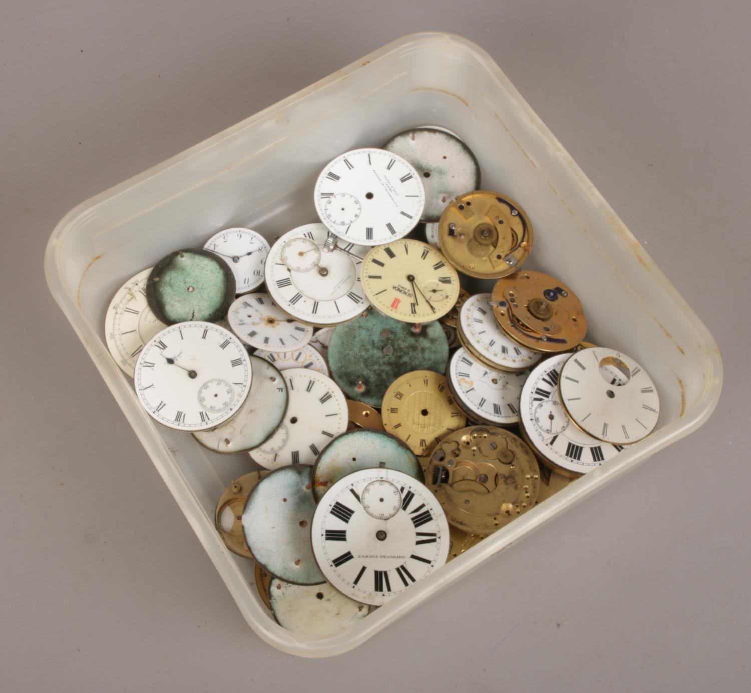 A box of watch movements and dials to include Sekonda, Waltham examples etc.