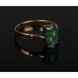 A vintage 9ct (tested unmarked) opal triplet ring. Size K 1/2.