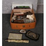 A box of collectables to include harmonica, beaded purse, model train on stand etc.