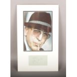 Kojak display, autographed by Telly Savalas.