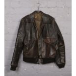 A US air force leather bomber jacket.