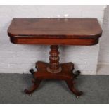 A Regency mahogany centre pedestal tea table.