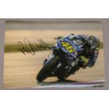A autographed photo of Valentino Rossi.