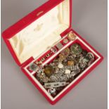 A jewellery case of costume jewellery to include rings, brooches, pendants, earrings etc.
