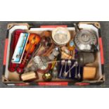 A box of collectables including silver plated wares, desk calendar, miniature violin and carved