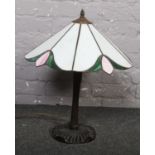 A Tiffany style table lamp with stained glass shade