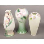 Three large Franz porcelain floral vases. (Tallest 36cm). Good condition.