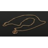 A 9ct gold pendant and chain, the pendant in the form of a letter J in rope twist border. (8.25g).