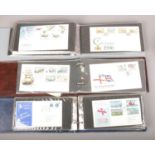 Three albums of Guernsey and Jersey first day covers.