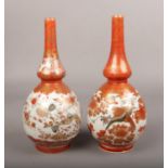 Two Japanese Kutani vases, both decorated with birds and flowers. (Height approximately 23cm).