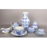 A small collection of blue and white pottery and porcelain. Including a Chinese baluster vase