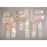 A collection of world bank notes in sleeves, to include Zimbabwe, Yugoslavia, Indonesia etc.