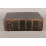 A large leather bound family Bible.