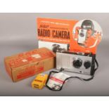 A boxed G.E.C Transistomatic Radio Camera, along with shop advertising card.