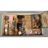 A tray of mainly costume jewellery including French jet, earrings, enamel badges and cufflinks etc.