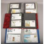 Three albums of military first day covers, to include many signed examples.