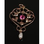 A 9ct gold red stone and pearl pendant. Test as 9ct gold.