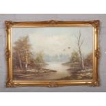 A large gilt frame oil on canvas, rural scene, signed H. Carrez.