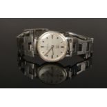 A Gentleman's Bulova Accutron stainless steel bracelet watch, 35mm wide. With box, gurantee, FAQ,