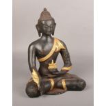 A Metal seated Buddha statue ( approx 29 cm height) late 20th century. Good condition.
