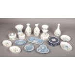 A collection of Wedgwood trinket boxes, pin dishes and bud vases. Including Jasperware, Wild