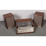 Sharp Vinyl player and FM multiplex amp model number GS-5500 to include sharp wooden cased speakers.